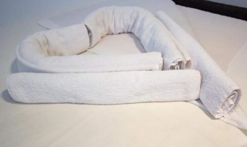 Deluxe Quadruple Room, 1 Bedroom | Premium bedding, minibar, in-room safe, desk