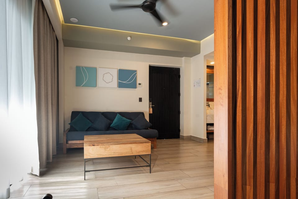 Junior Suite Partial Lagoon View | Living area | 32-inch Smart TV with satellite channels