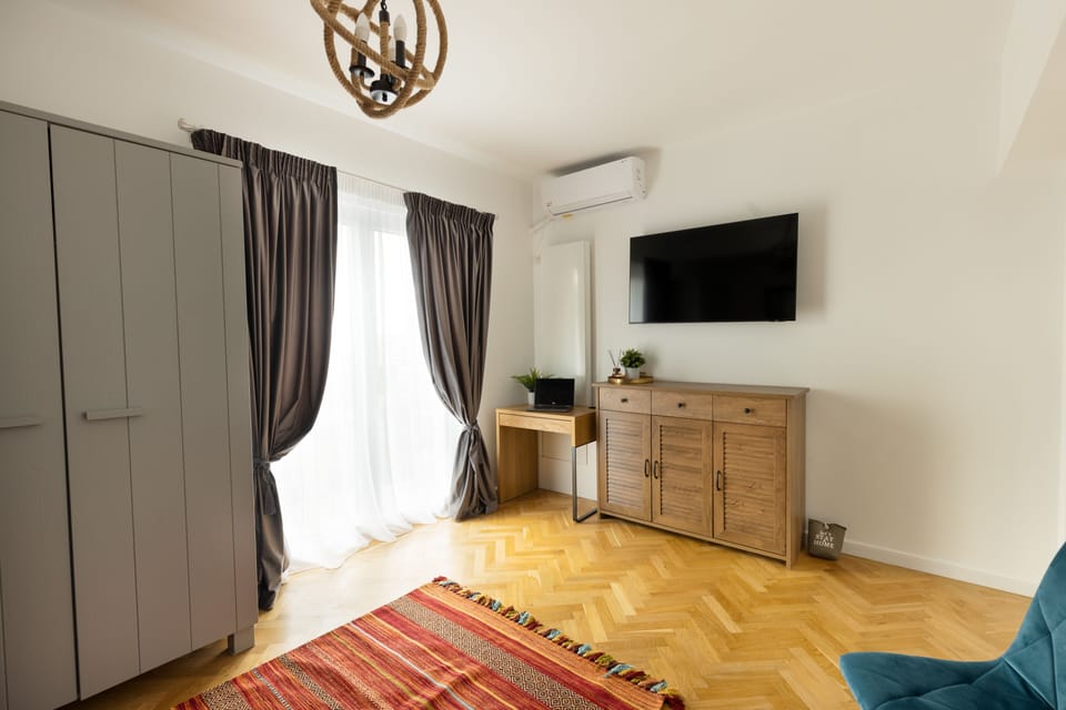 Panoramic Apartment | Living area | 123-cm LED TV with digital channels, TV