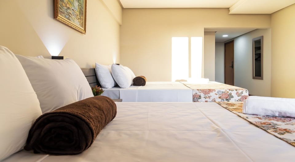 Deluxe Room, 1 Bedroom, Private Bathroom | Hypo-allergenic bedding, in-room safe, individually decorated