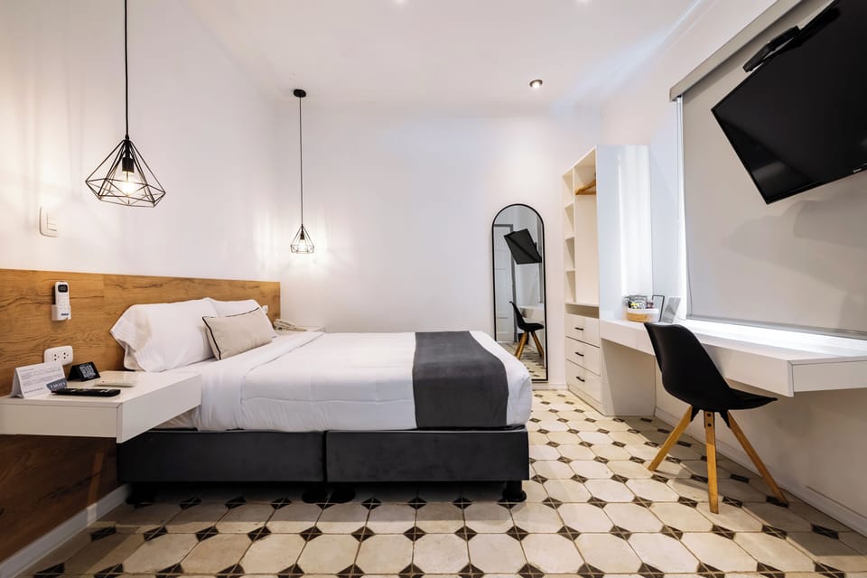 Deluxe Suite | Down comforters, Select Comfort beds, in-room safe, desk