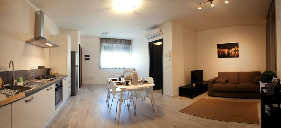 Apartment, 1 Bedroom | Living area | Flat-screen TV