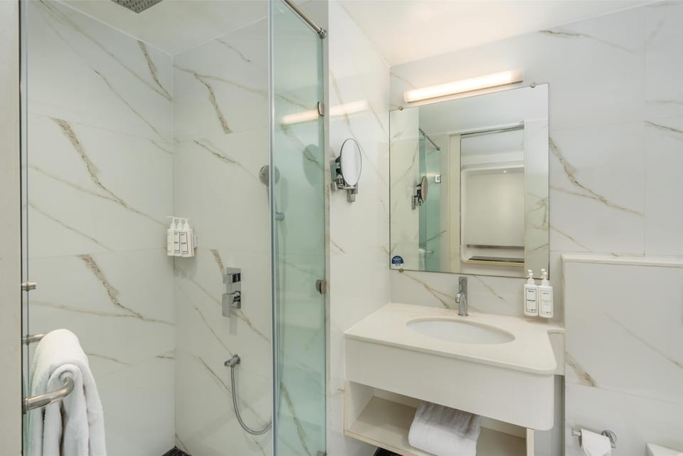 Shower, eco-friendly toiletries, hair dryer, bidet