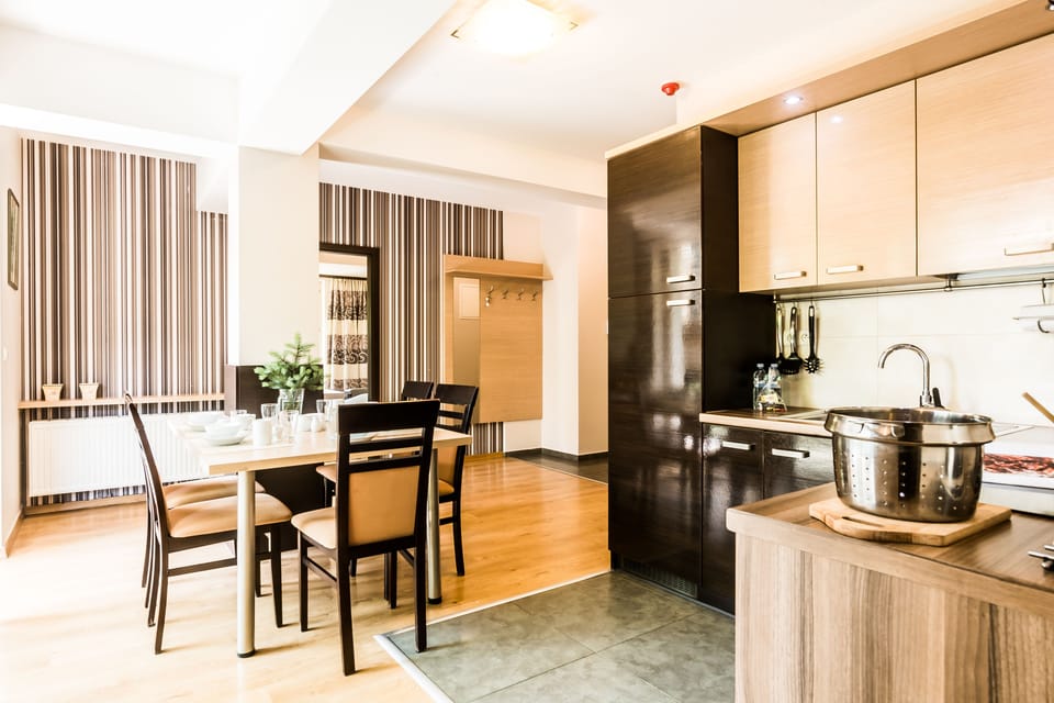 Apartment, 1 Bedroom, Kitchen (Polana 97) | Living room | Flat-screen TV