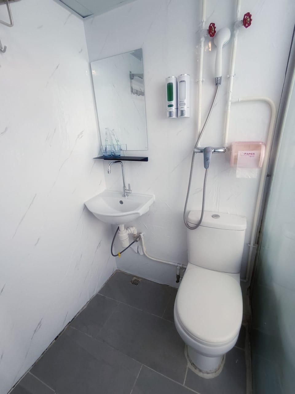 Shower, free toiletries, hair dryer, slippers