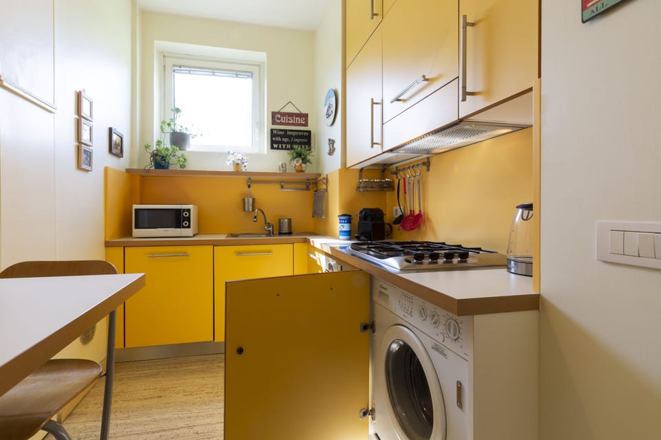 Design Apartment | Private kitchen | Full-size fridge, microwave, oven, stovetop