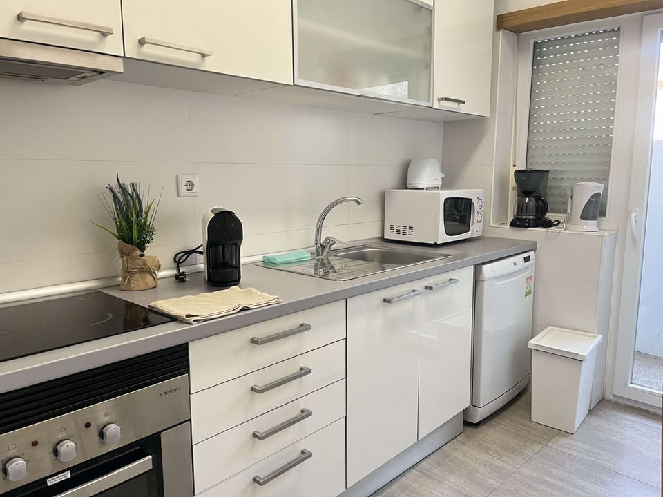 Apartment | Private kitchen | Full-size fridge, microwave, oven, stovetop