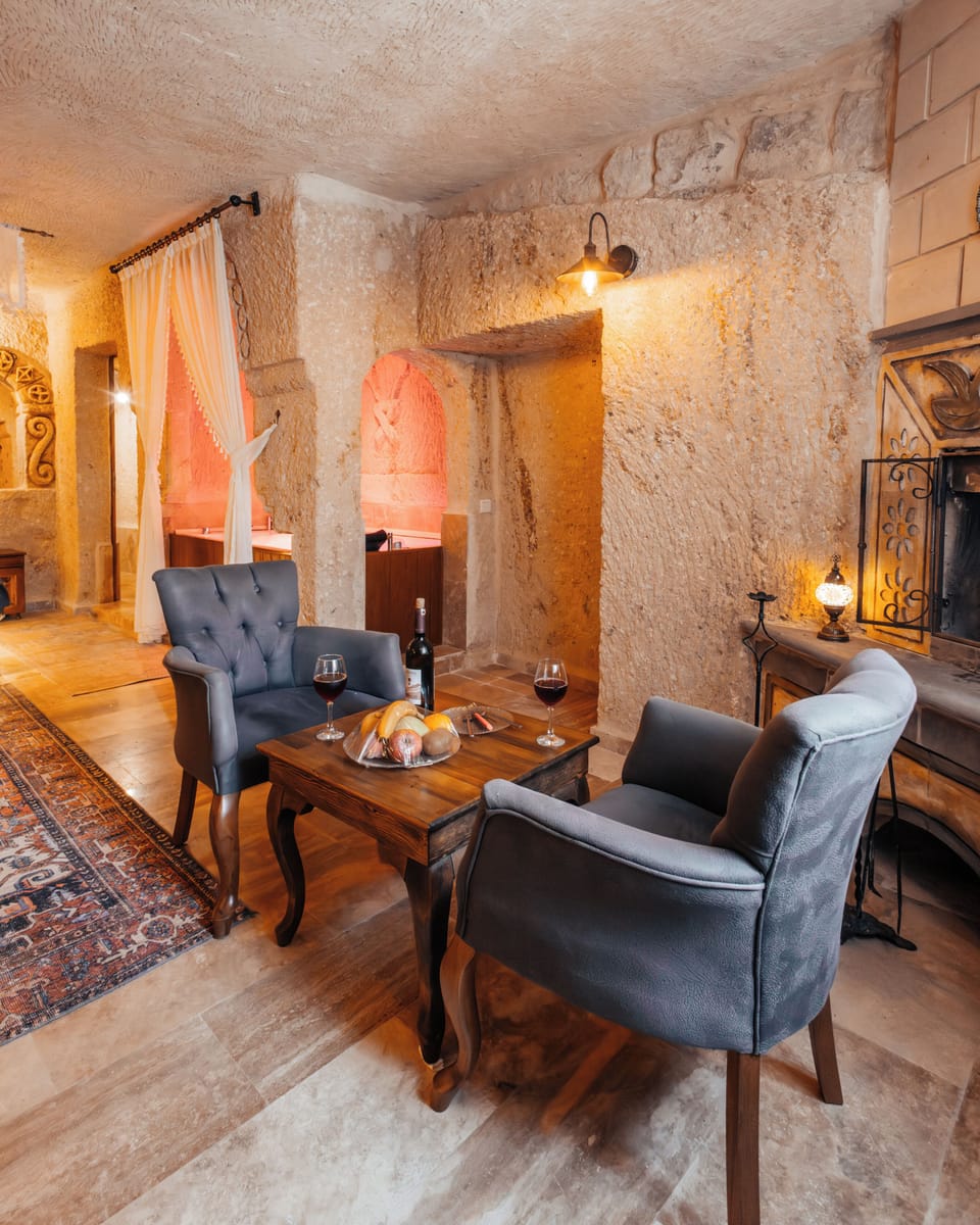 Royal Suite | Living area | 44-inch Smart TV with digital channels, TV, heated floors