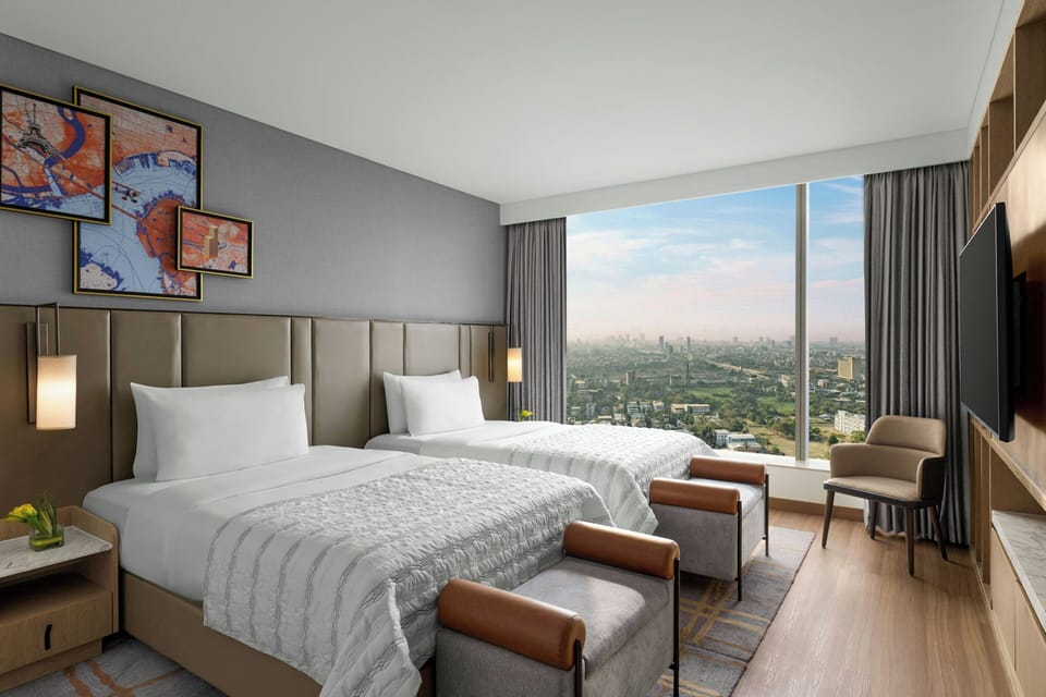 Premium bedding, down comforters, minibar, in-room safe