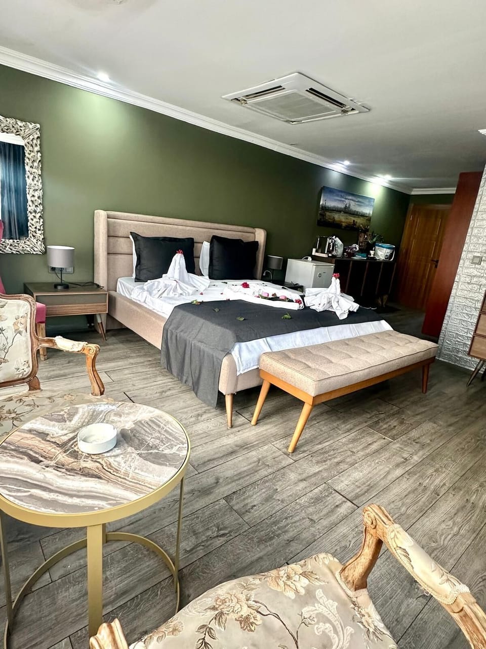 Luxury Suite, Balcony, Sea View | Minibar, individually decorated, individually furnished, desk