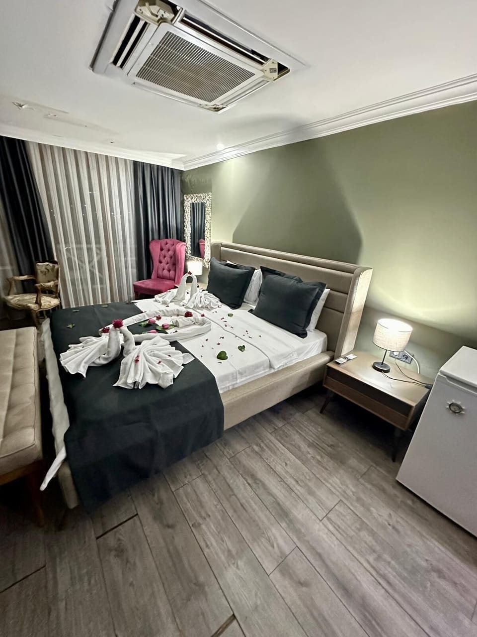 Luxury Suite, Balcony, Sea View | Minibar, individually decorated, individually furnished, desk