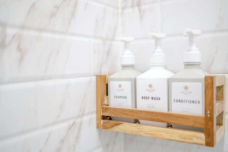 Shower, designer toiletries, hair dryer, bidet