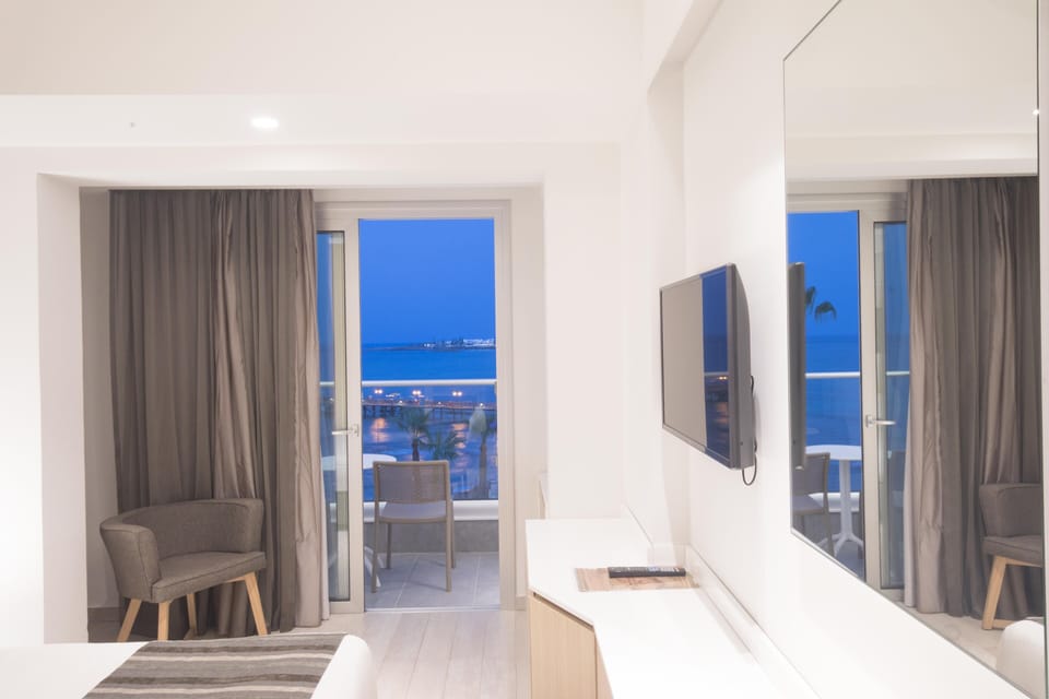 Double or Twin Room, Sea View | Minibar, in-room safe, desk, laptop workspace