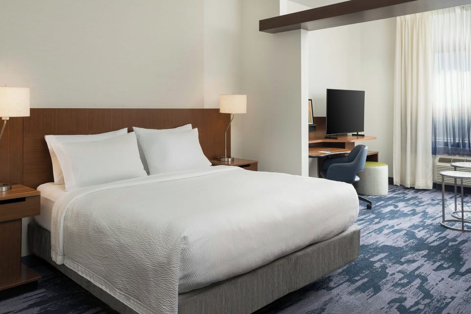 Hypo-allergenic bedding, desk, laptop workspace, iron/ironing board