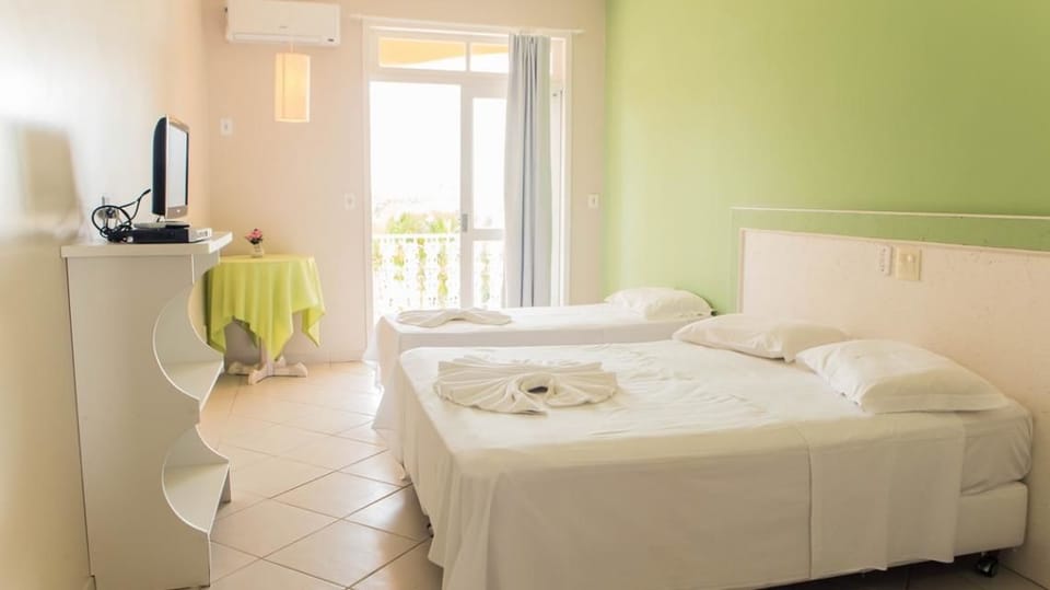 Standard Double or Twin Room | Minibar, in-room safe, individually decorated, desk