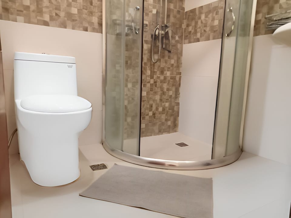 Standard Room, 2 Double Beds, Non Smoking, Ground Floor | Bathroom | Shower, hydromassage showerhead, free toiletries, bidet