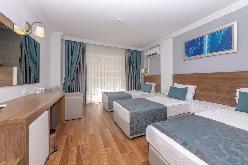 Free minibar items, in-room safe, desk, laptop workspace