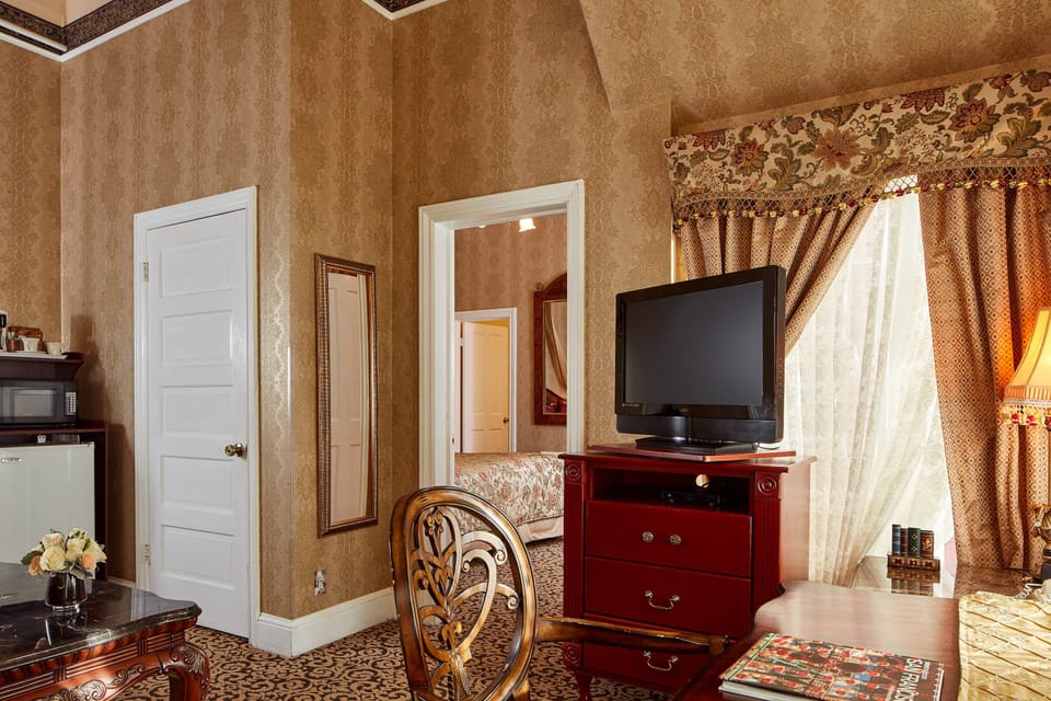 Suite, 1 Bedroom | In-room safe, individually decorated, desk, blackout drapes