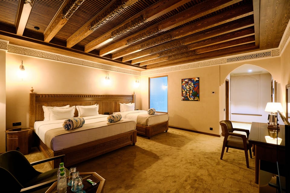 Family Triple Room | In-room safe, desk, laptop workspace, blackout drapes