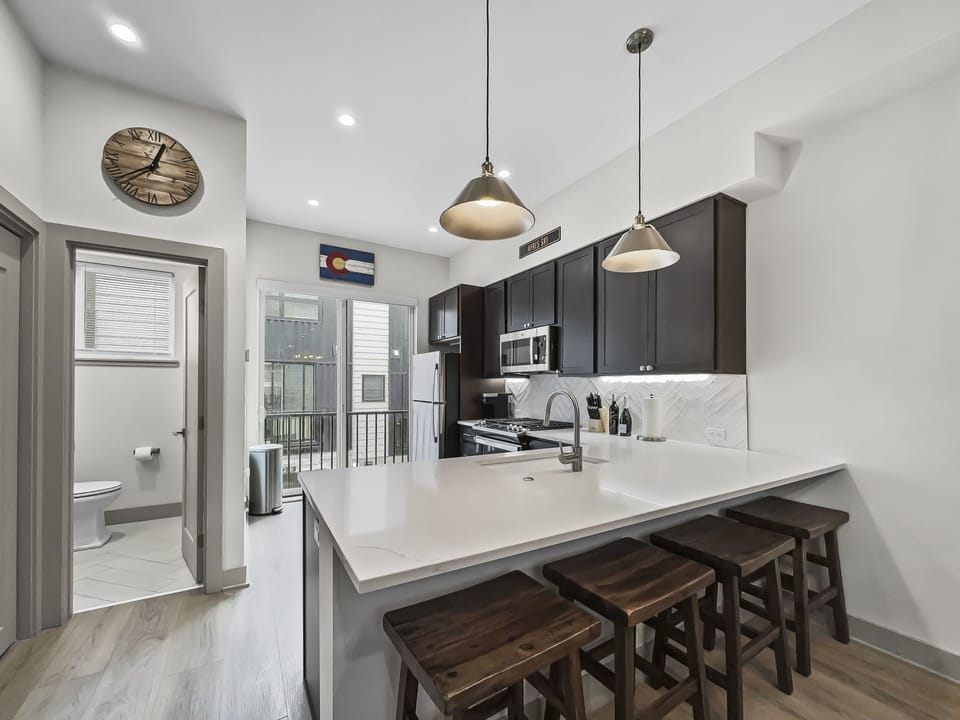 Townhome, 2 Bedrooms | Private kitchen | Fridge, oven, coffee/tea maker, toaster