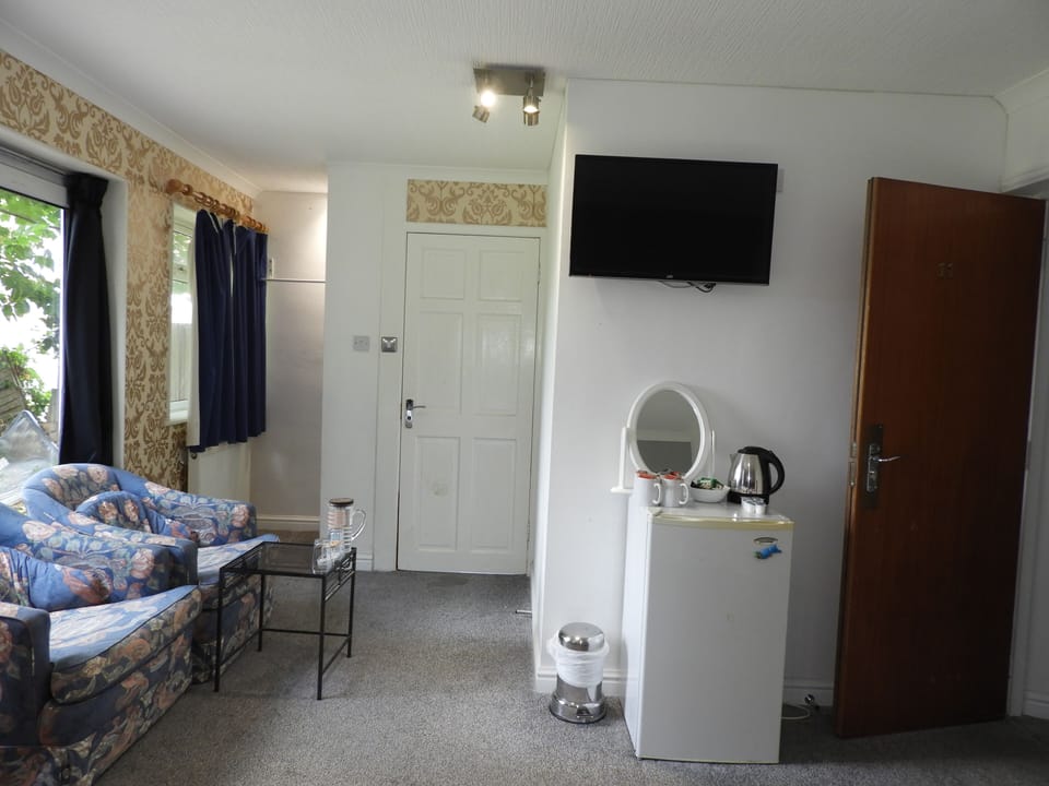 Comfort Quadruple Room, 2 Double Beds | Iron/ironing board, free WiFi