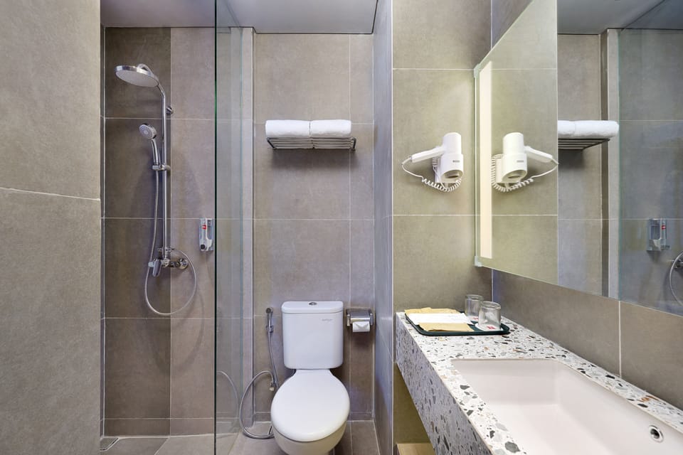 Shower, rainfall showerhead, eco-friendly toiletries, hair dryer