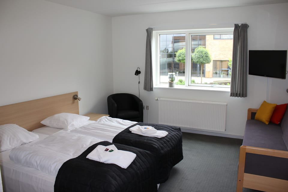 Standard Triple Room, Private Bathroom | Desk, free WiFi, bed sheets