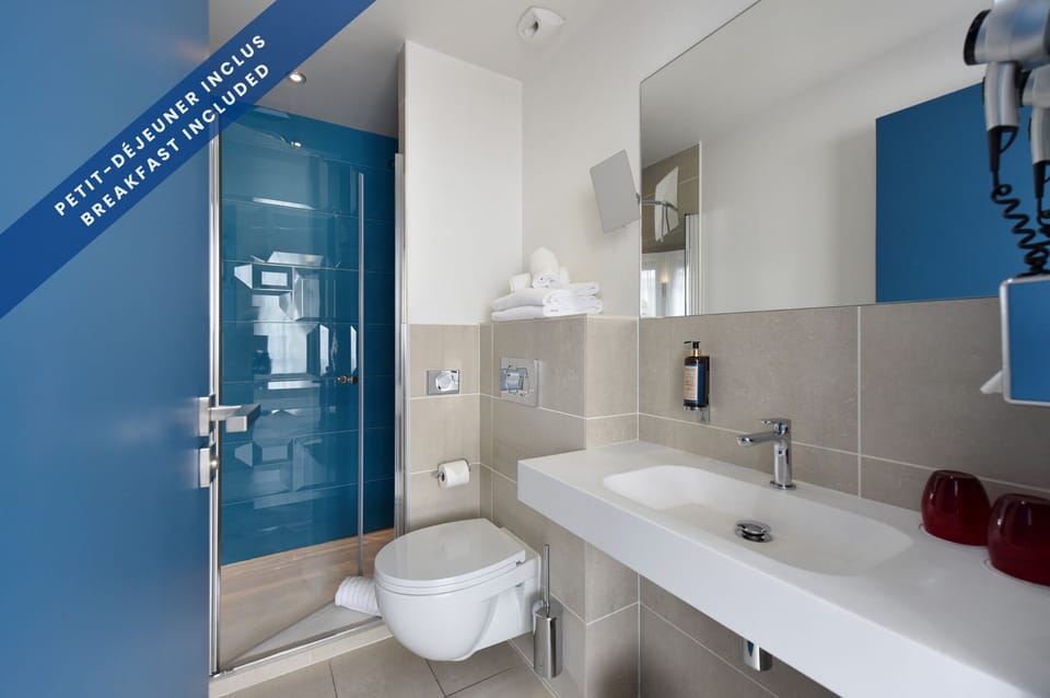 Superior Room | Bathroom | Hair dryer, towels, soap, shampoo