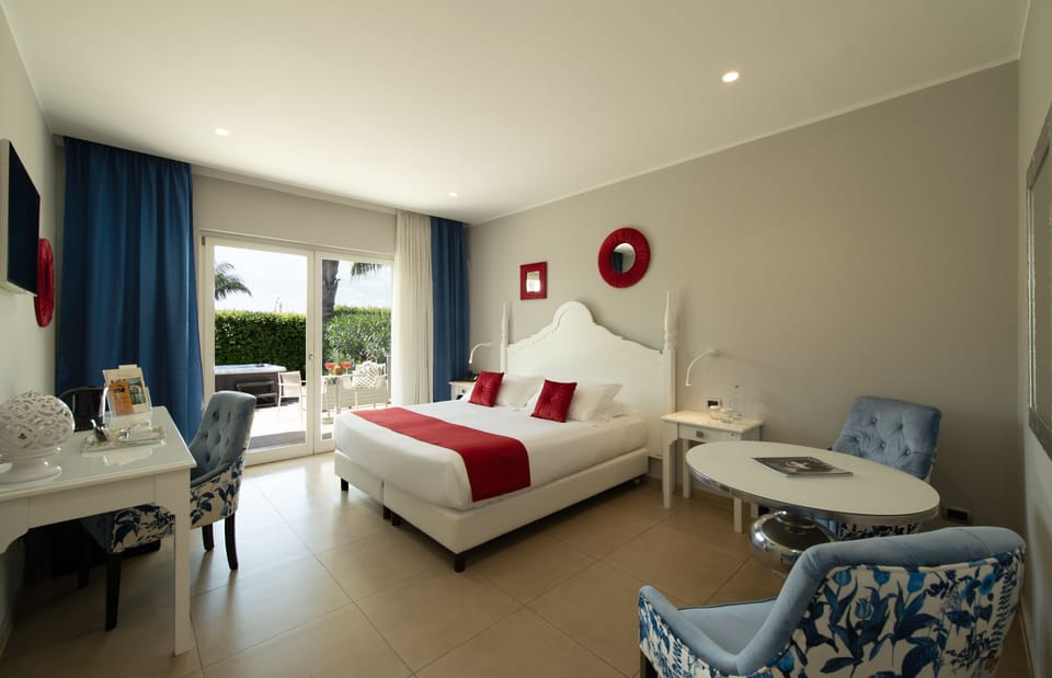 Deluxe with Patio Annex Building | Premium bedding, memory foam beds, minibar, in-room safe