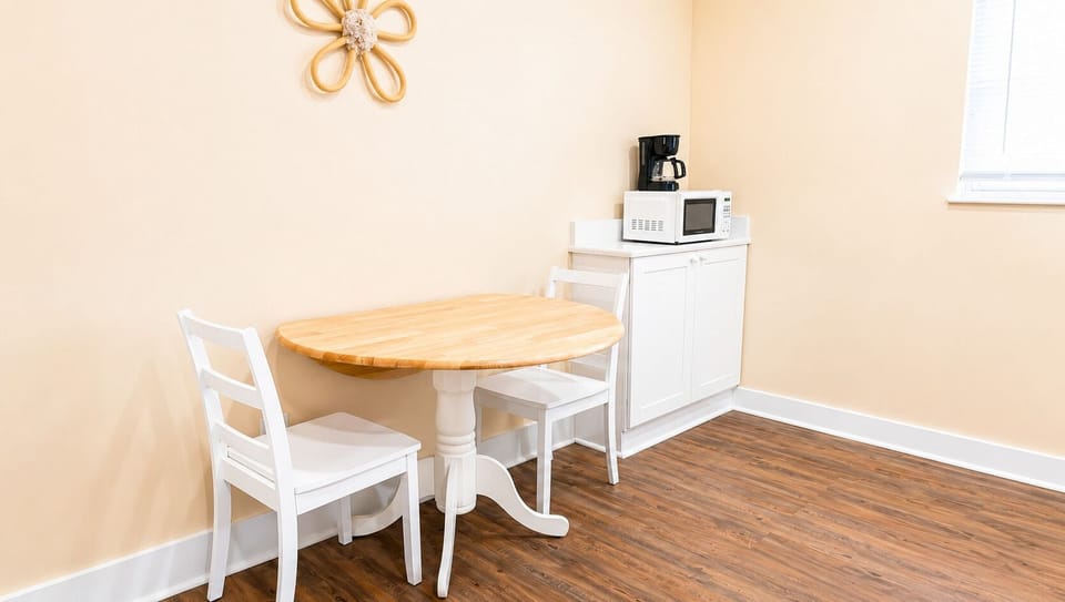 Room, 2 Queen Beds, Non Smoking, Kitchenette | Living area | 43-inch TV with cable channels