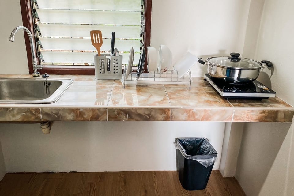 Deluxe Bungalow | Private kitchen | Fridge, electric kettle