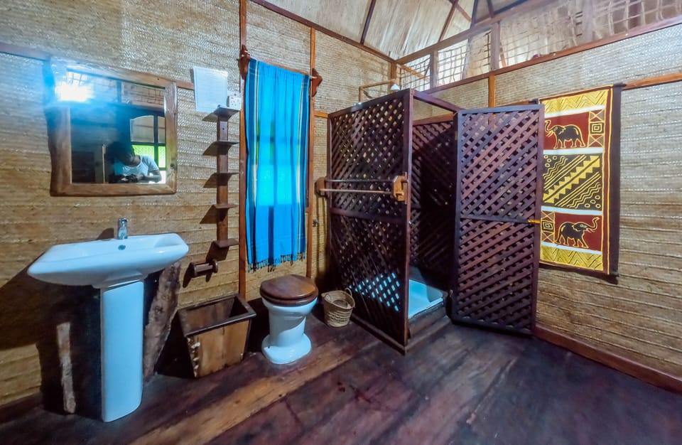 Shower, rainfall showerhead, bathrobes, towels