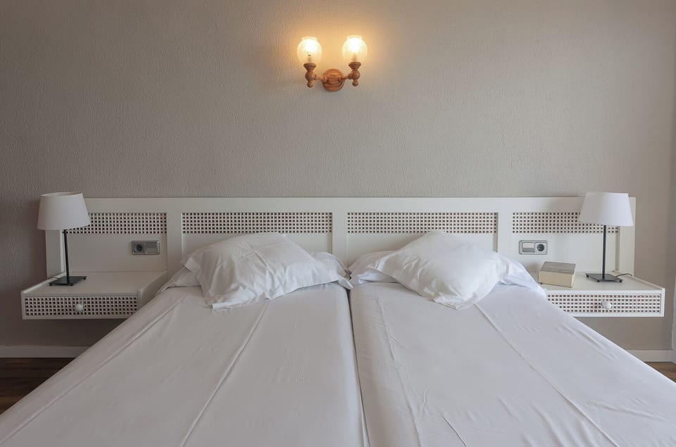 Double Room, Balcony, Sea View | In-room safe, blackout drapes, free WiFi, bed sheets