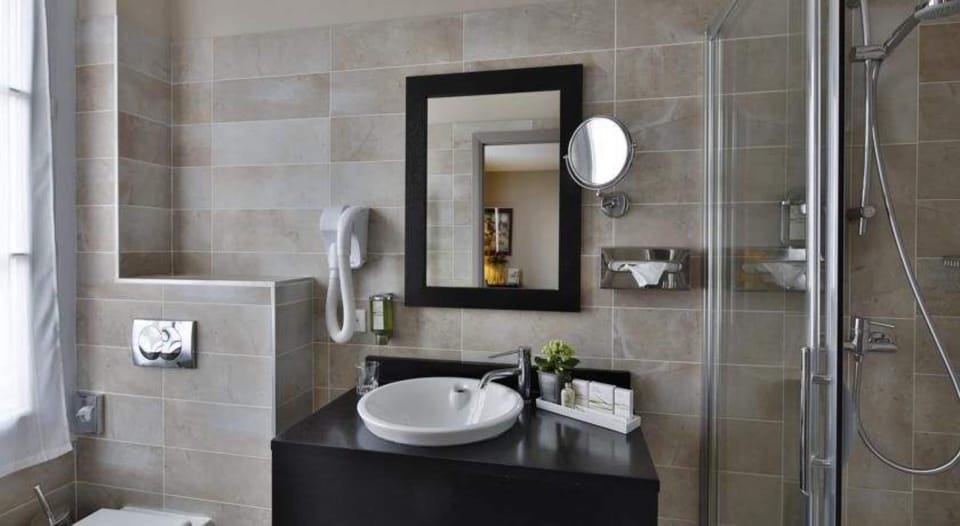 Shower, free toiletries, hair dryer, slippers