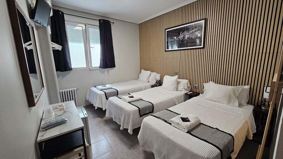 Family Room (3 people) | Desk, blackout drapes, iron/ironing board, free WiFi