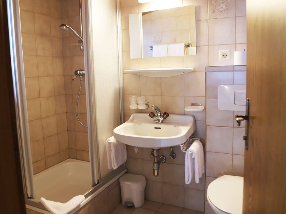Family Room, Mountain View | Bathroom | Hair dryer, towels