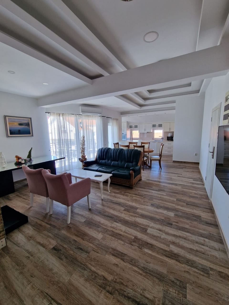 Executive Apartment | Living area | Smart TV, heated floors, printers