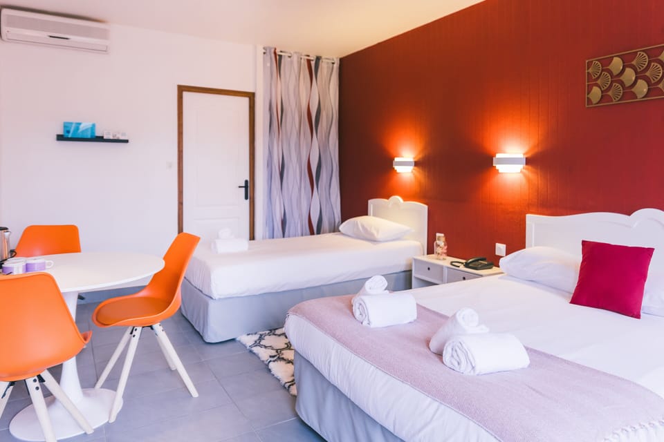 Family Room | 1 bedroom, in-room safe, blackout drapes, free WiFi