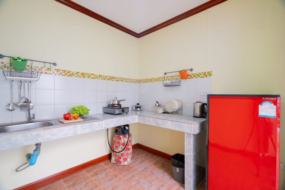 Apartment, 1 Bedroom | Private kitchen | Fridge, stovetop, coffee/tea maker, electric kettle