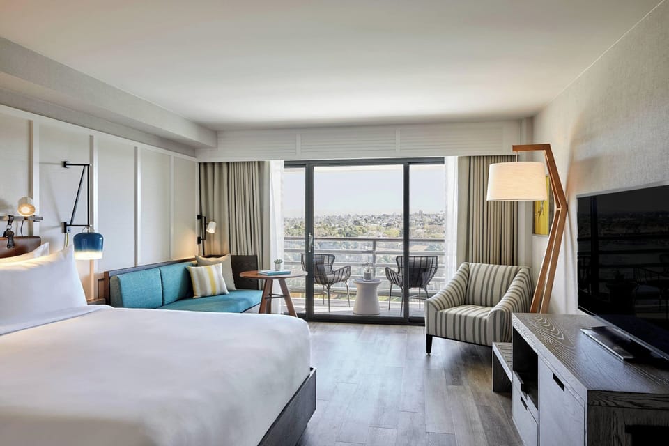 Down comforters, pillowtop beds, in-room safe, desk