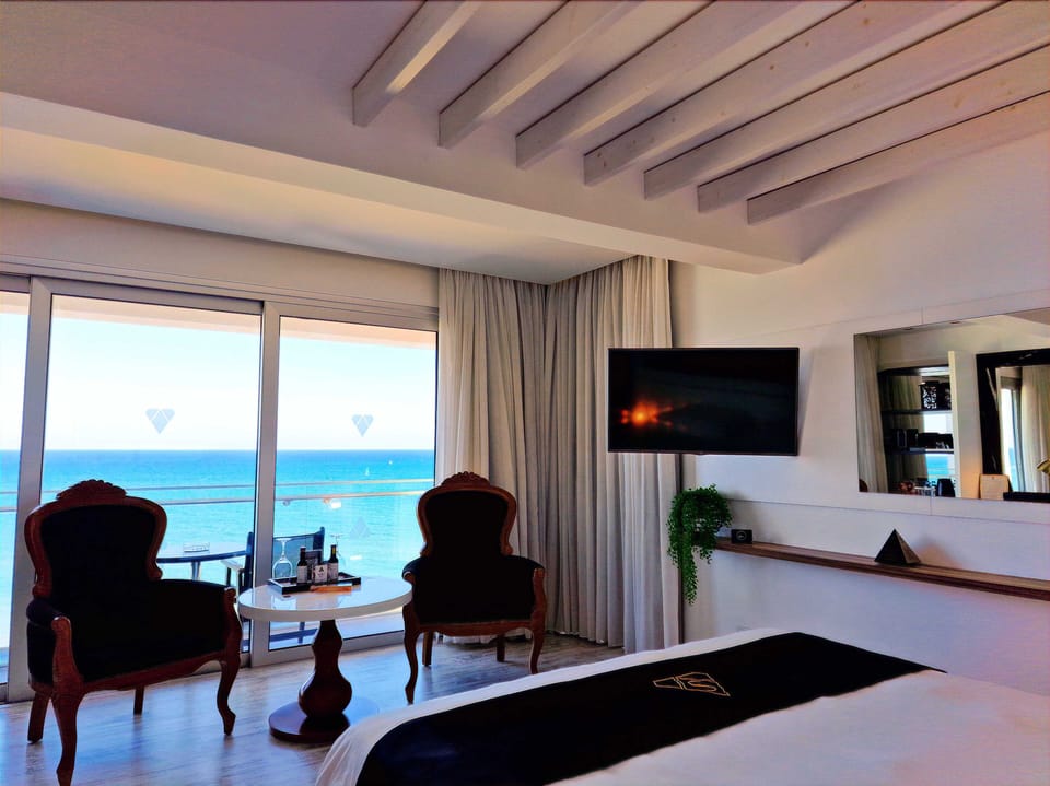 Deluxe Double Room, Balcony, Sea View | Premium bedding, minibar, in-room safe, individually furnished
