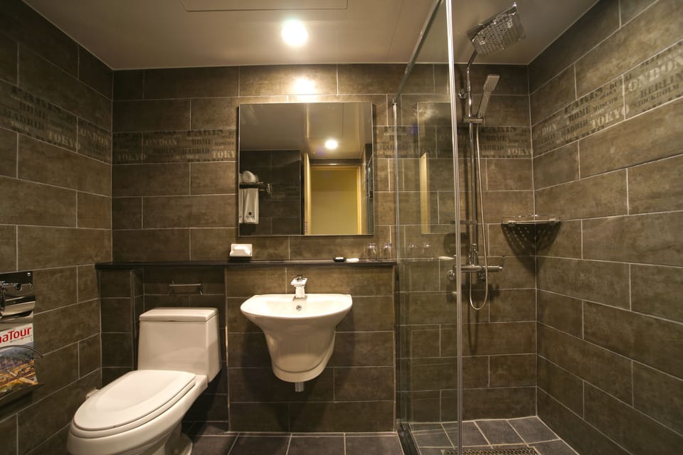 Shower, free toiletries, hair dryer, slippers