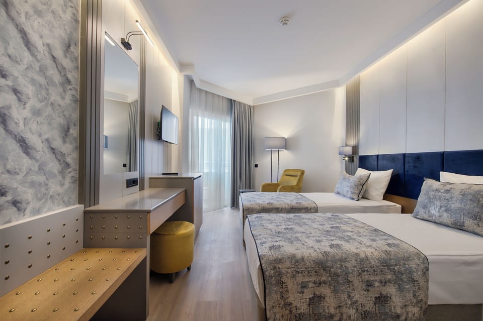 Standard Triple Room, Non Smoking | Minibar, in-room safe, free WiFi, bed sheets