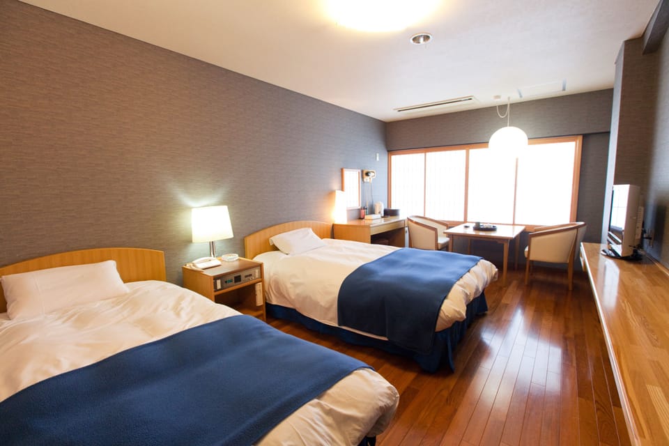 Standard Twin Room, Smoking | In-room safe, iron/ironing board (on request), WiFi (free), bed sheets