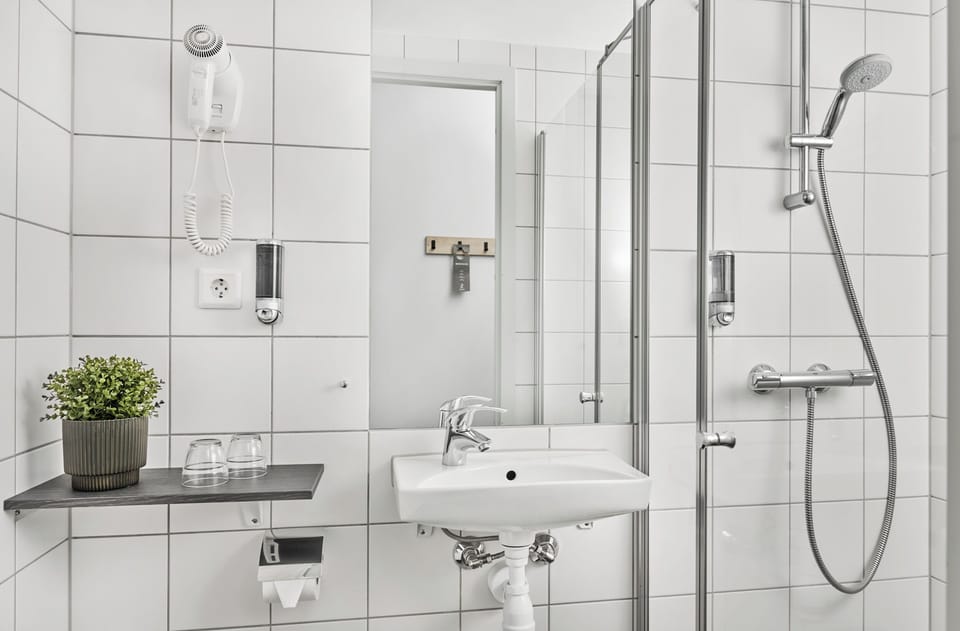 Shower, hair dryer (on request), heated floors (bathroom), towels