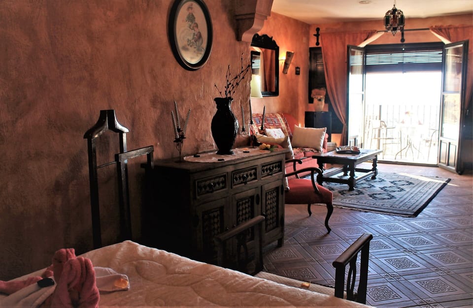 Executive Suite | Desk, blackout drapes, iron/ironing board (on request), cribs (free)