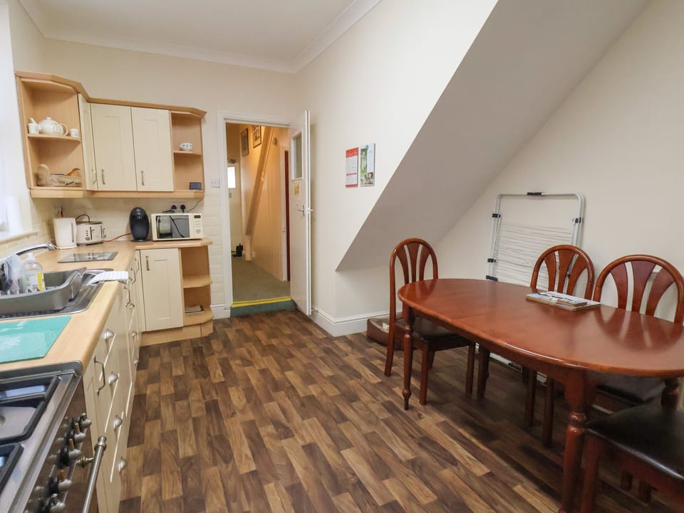 Fridge, electric kettle, toaster, cookware/dishes/utensils