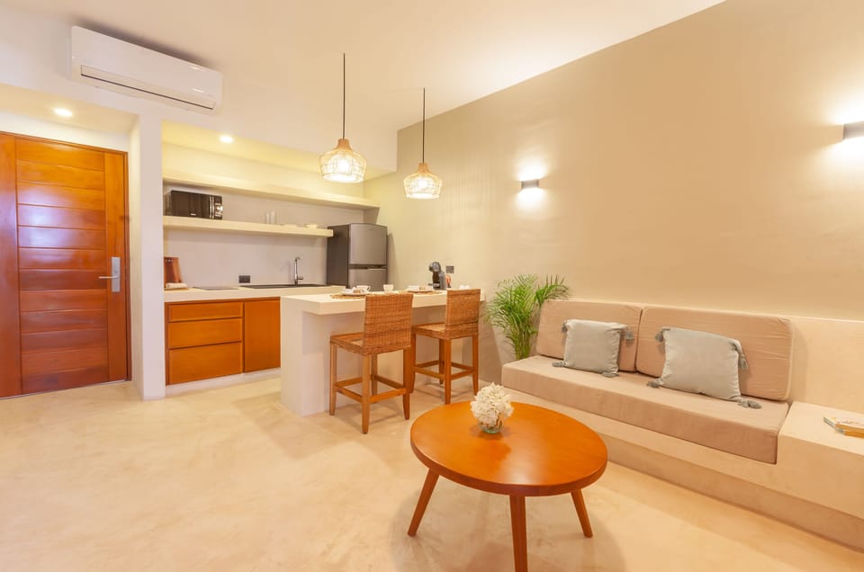 Balcony Suite | Living area | 42-inch Smart TV with digital channels, TV, Netflix