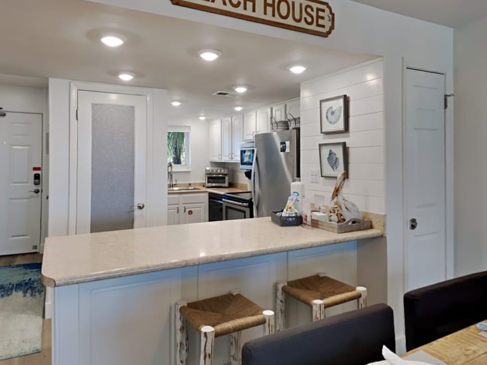 Condo, Multiple Beds, Balcony, Ocean View (#1F) | Private kitchen | Fridge, microwave, oven, stovetop