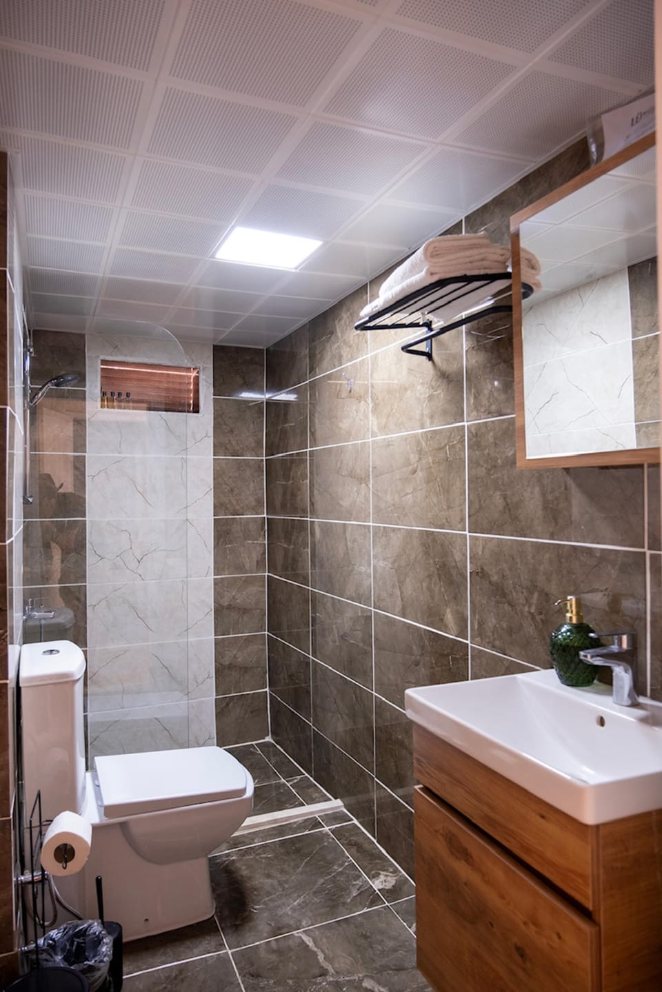 Shower, free toiletries, hair dryer, slippers